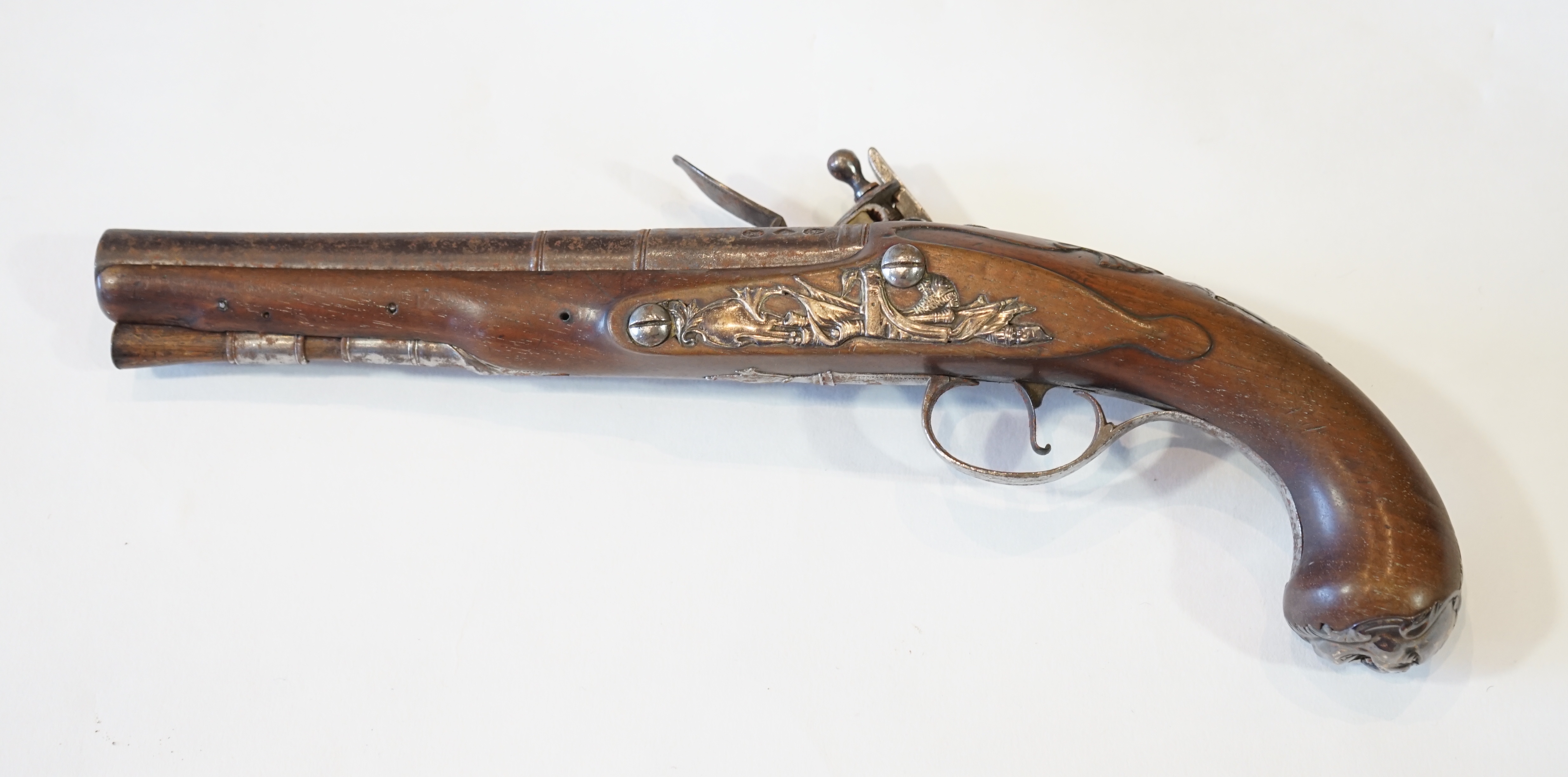 A partly silver mounted flintlock holster pistol by E. North of London, c.1760